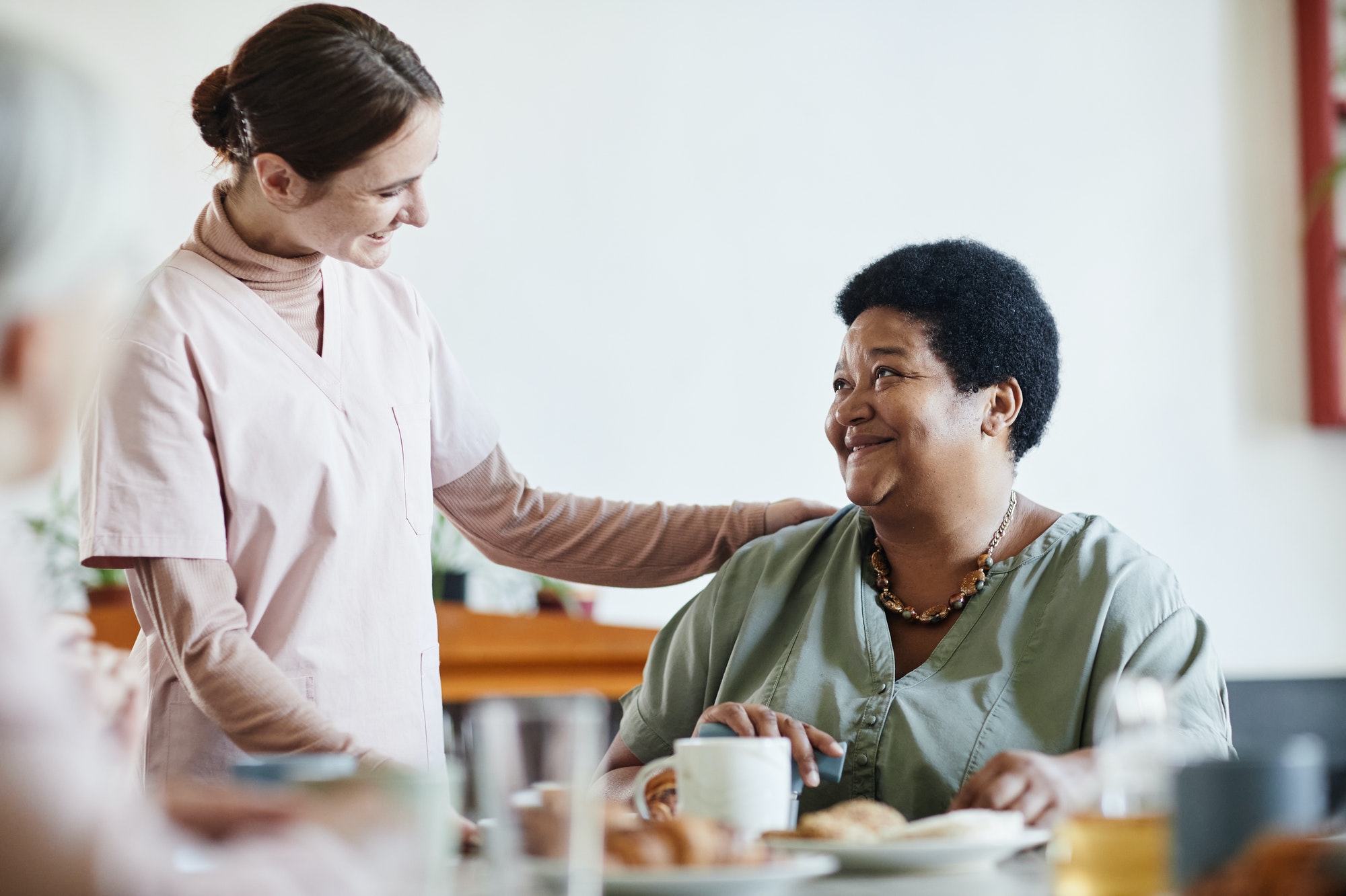 caring-young-woman-working-in-nursing-home.jpg